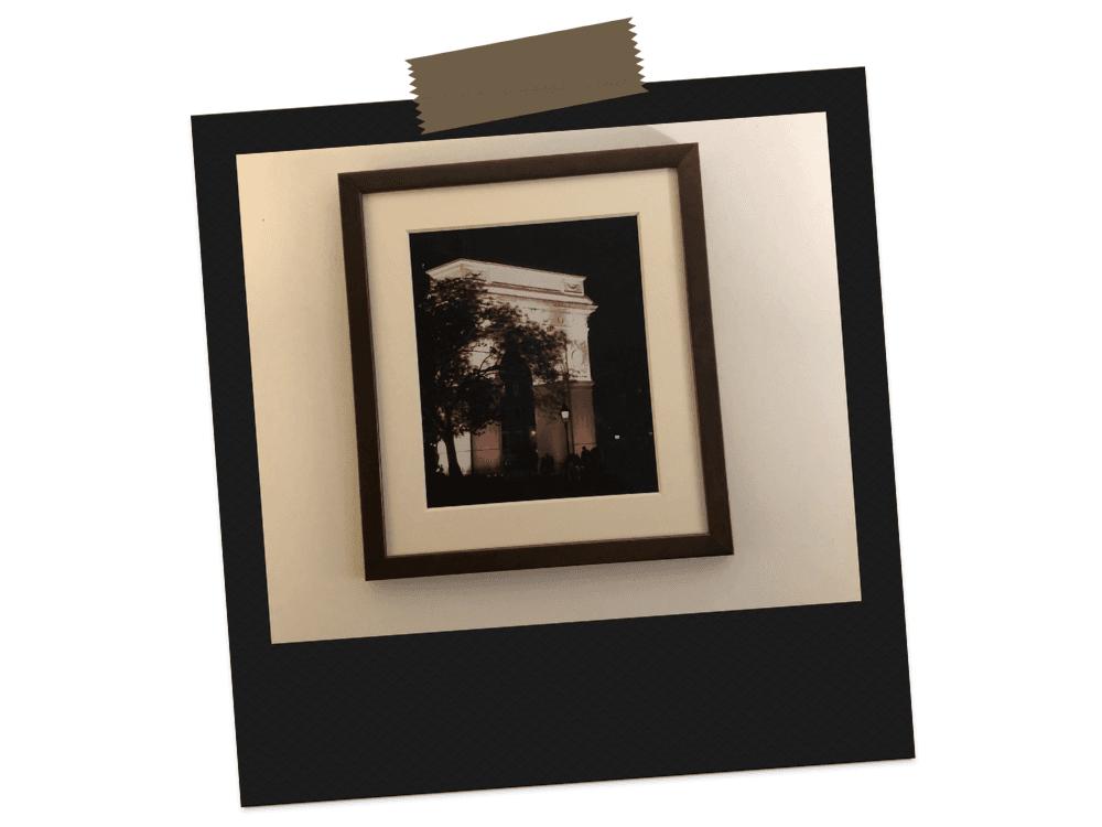 A framed picture of the Washington Square Arch.