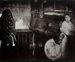 Black-and-tan saloon. Courtesy of Jacob Riis, NYPL Collection