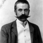black and white image of Stanford White in 1892, at approximately 39 years old.