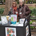 Pat (left) and her fellow Greeter, Martha (right) at an in-person greeting session in 2018