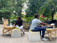 people at an open air writing studio